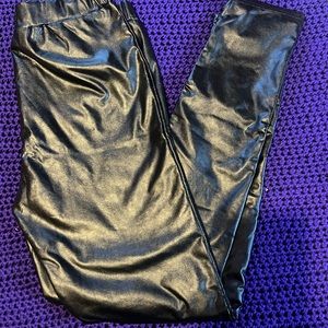 Pick this for the next date night party.A pair of sexy black faux leather pants